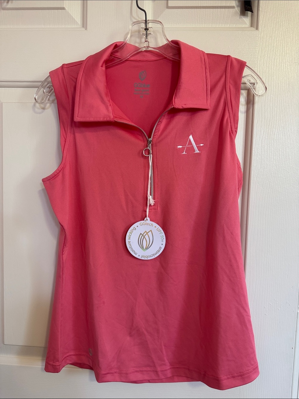 Women’s Sleeveless Zip Polo in Bright Pink with Embroidered A